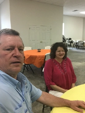 Walter James, pastor of Mt Zion Baptist Church, pictured in casual attire during a church fellowship meal